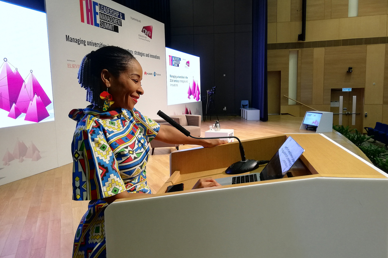 VC Prof Mamokgethi Phakeng at the podium addressing the&nbsp;Times Higher Education&nbsp;Leadership and Management Summit, hosted by <a href="https://www.timeshighereducation.com/world-university-rankings/city-university-hong-kong" target="_blank" rel="noopener">City University of Hong Kong</a>.