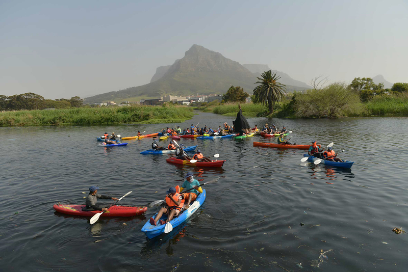 Paddlers gather around the Lady of Hope on the Black River near Maitland. <b>Photo</b> Bruce Sutherland / City of Cape Town.