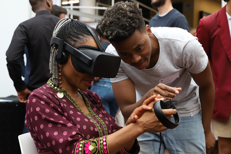 VC Prof Mamokgethi Phakeng gets some one-on-one hi-tech instruction at the annual School of IT showcase.