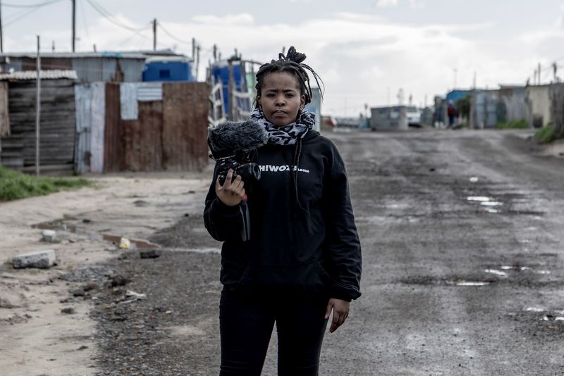 Zintle Qubuda on a shoot day of the 2018 Eh!woza media workshops. Zintle’s group made a film about her experience of having TB as a child, interspersed with interviews with her family and people living in her neighbourhood. 