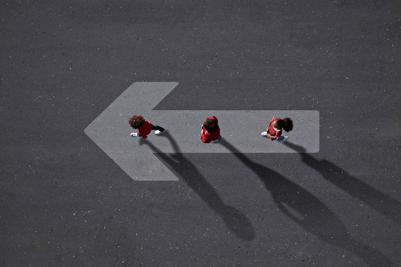Three UCT students have been selected among a global cohort of 40 for the Next Generation Leaders programme. <strong>Photo</strong>&nbsp;<a href="https://www.gettyimages.com/detail/photo/school-children-dressed-in-red-walking-across-big-royalty-free-image/1084071362?adppopup=true" target="_blank">Getty Images</a>.