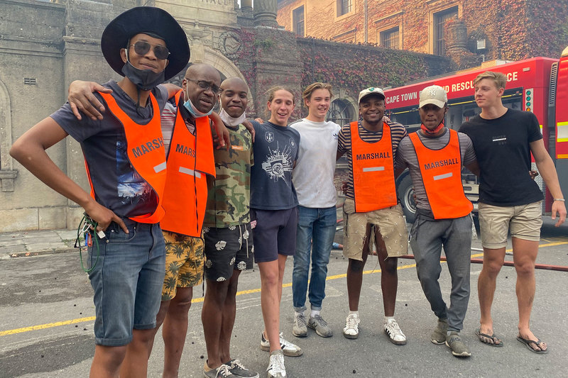 The valiant team that contained the fires at Smuts Hall, the historical men’s residence, on 18 April (from left) Kealeboga Keretetse, Prof Kelly Chibale, Kalaba Chibale, Brandon Badenhorst, Dean Gibson, Siyabulela Ntuntwana, Tafara Mkombe and Kyle Jira.