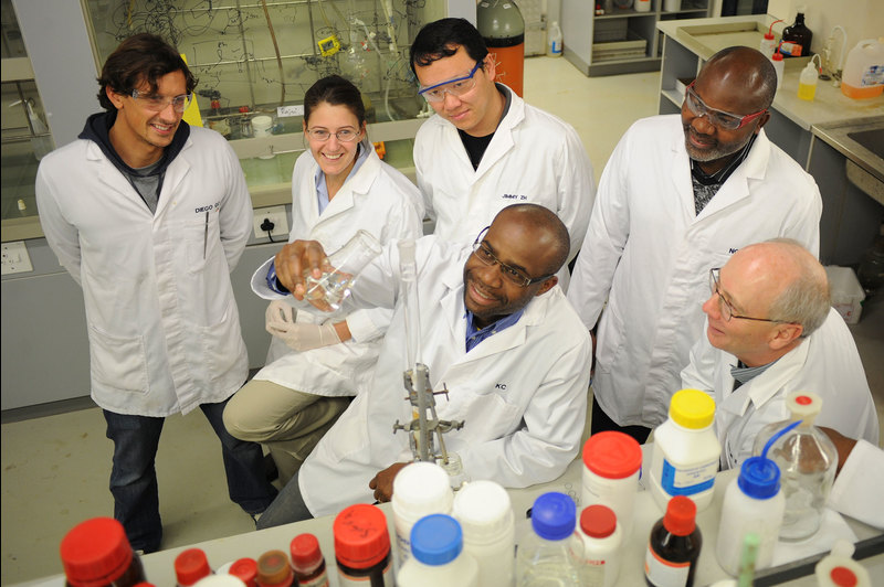 UCT’s Prof Kelly Chibale (centre) with his team at H3D.