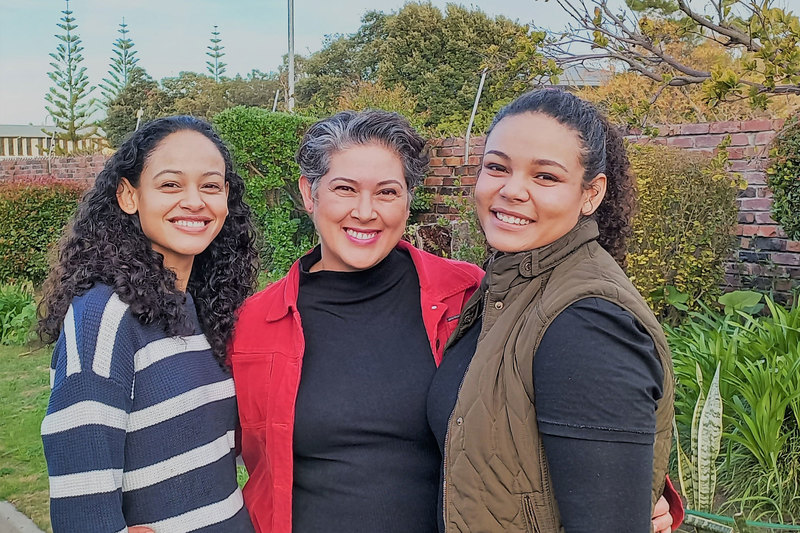 It’s a family affair: Alison Geduld (centre) and her oldest daughter, Savannah Steyn (right), are celebrating their first graduations as Alison’s youngest daughter, Dakota Steyn (left), cheers them on.