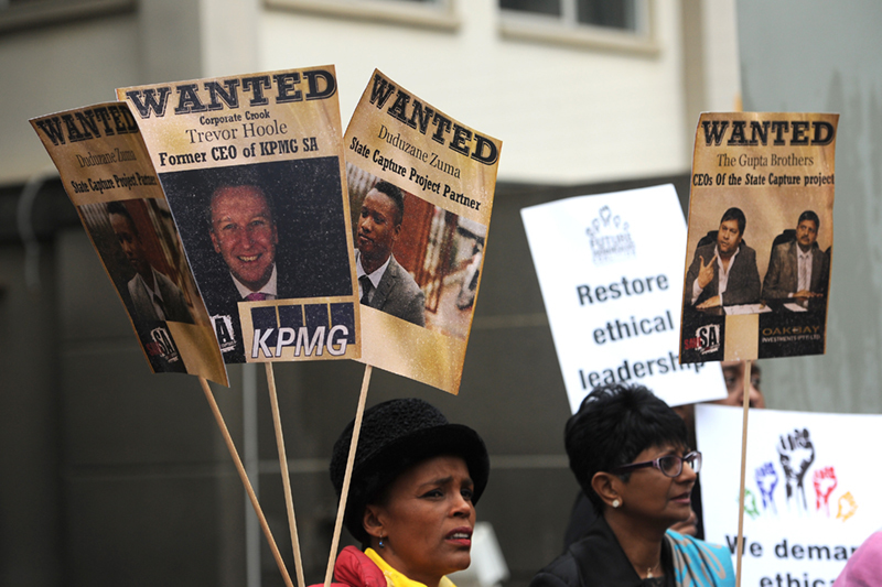 Future SA supporters picket outside the McKinsey offices on 5 October 2017 in Sandton, South Africa. The civil society group protested against the way in which the global company conducted itself in relation to its empowerment partner Trillian Capital and their business deals with Eskom.