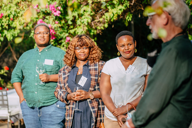 Acting DVC for Transformation Emer Prof Martin Hall (right) addresses members of the ATAP cohort. In the picture are (from left) Ole Mogomotsi (PhD candidate), Dr Sisanda Mguzulwa (postdoctoral research fellow) and Dr Simphiwe Sisande (PhD candidate).