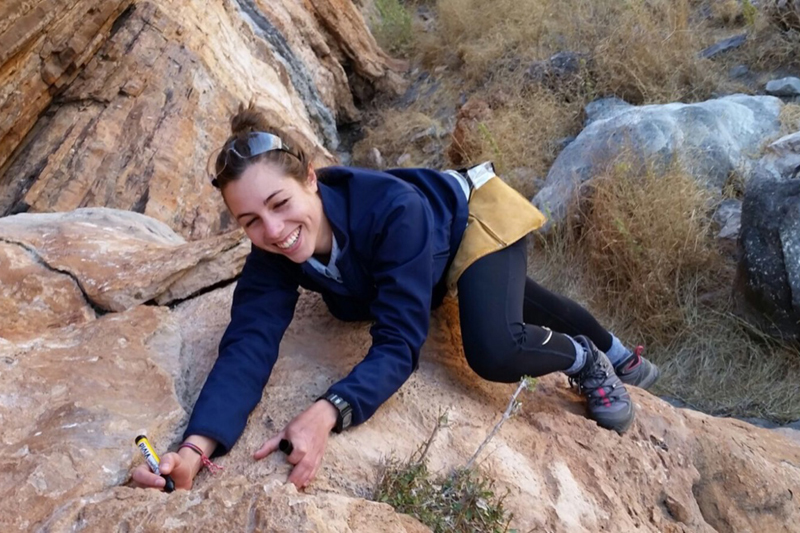 PhD candidate and first author of the PLOS ONE publication Jessica von der Meden marks an area of the tufa formation for sampling. <b>Photo</b> Ben Schoville.