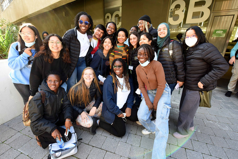 VC Prof Mamokgethi Phakeng poses with a group of global winners before taking a tour of upper campus.