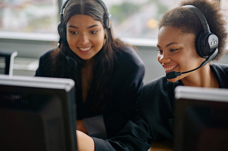 UCT&rsquo;s National HIV and TB Healthcare Worker hotline is manned by a team of expert pharmacists. The service is considered a valuable, quick and easy-to-use resource for those in need. <b>Photo</b> <a href="https://www.pexels.com/photo/smiling-women-in-black-blazers-wearing-headsets-looking-at-a-computer-monitor-8867376/" target="_blank">Pexels</a>.
