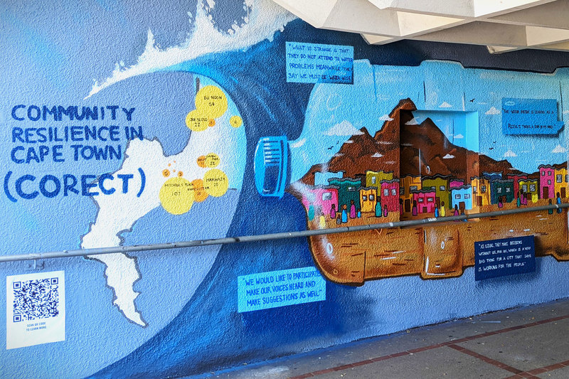UCT researchers recently teamed up with Interfer to create a new mural visualising the stories of local community members’ experiences of water. <b>Photo</b> Michelle Shields.