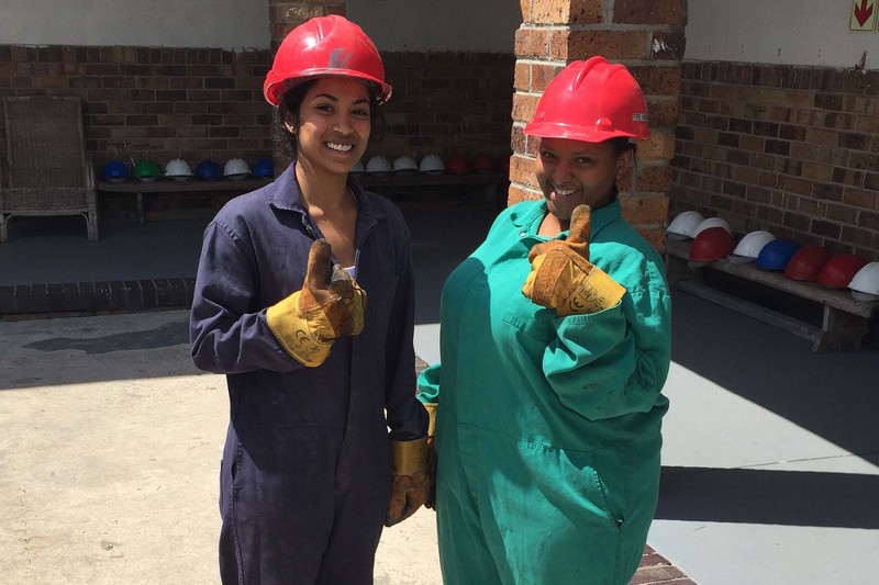 Final-year chemical engineering students Desania Govender and Yandisa Sojola during fire testing in 2015. Their DIY foam fire extinguisher, developed for their final-year project, is now the top hack on dooiy.
