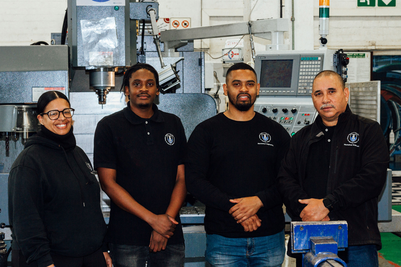 (From left) Laureen Bailey, Thulani Lieke, Grant Springle and Pierre Smith in the workshop. 