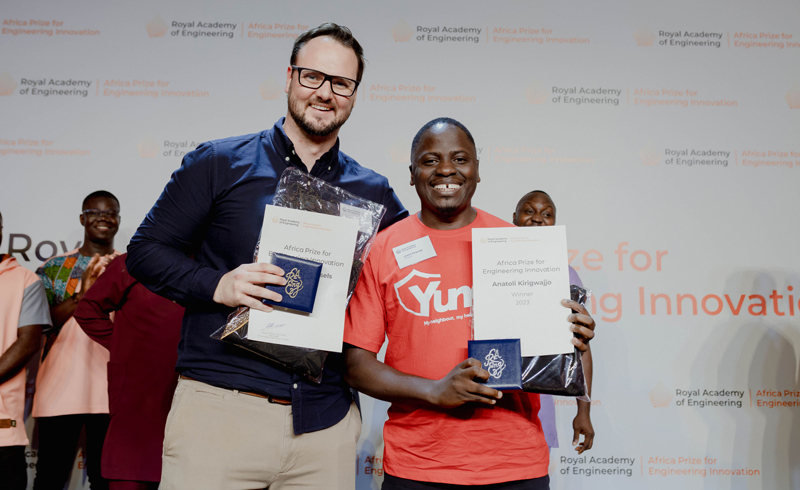 Edmund Wessels (left) alongside Anatoli Kirigwajjo after they were named joint winners of the 2023 Africa Prize for Engineering Innovation.