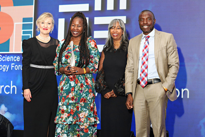 Professor Salome Maswime (second from left) received the SAMRC Clinician-Scientist Award at the 2023 NSTF-South 32 awards. 