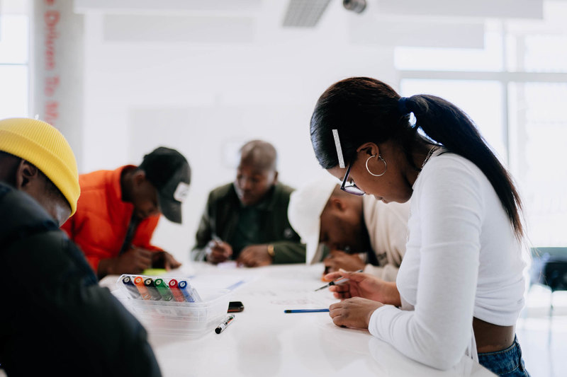 A participant in the Design Thinking Dash gets down to work at the Hasso Plattner d-school Afrika. 