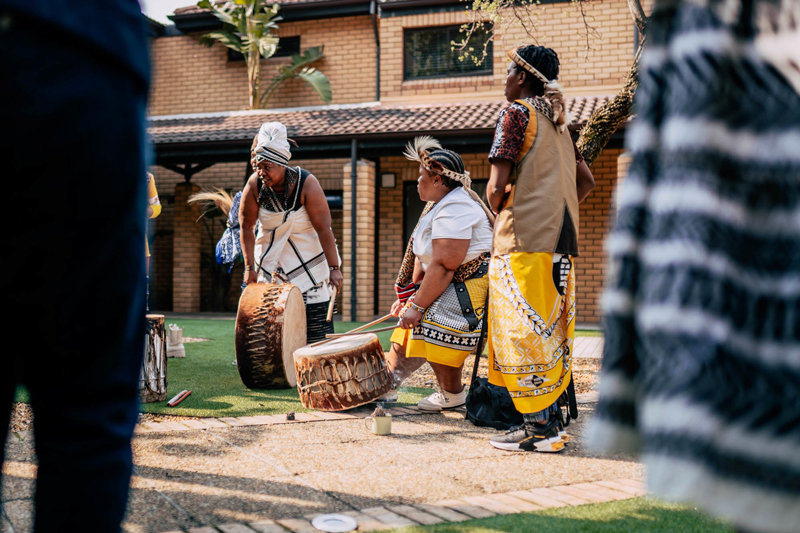 The indaba started with an outdoors ceremony of drumming, singing and prayer. Traditional healers and leaders introduced their clans and welcomed their ancestors to the space, acknowledging the sacred land on which UCT stands and the first nations who once lived there. 
