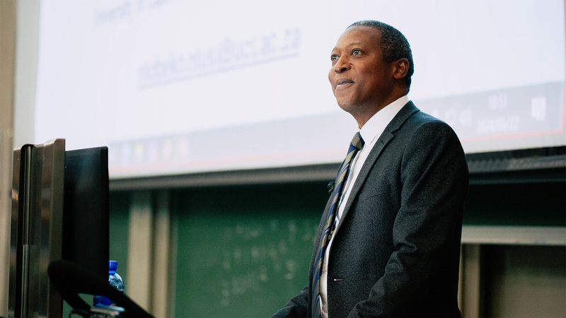 Prof Ntobeko Ntusi addresses a full lecture theatre in Groote Schuur Hospital on Wednesday, 22 May.