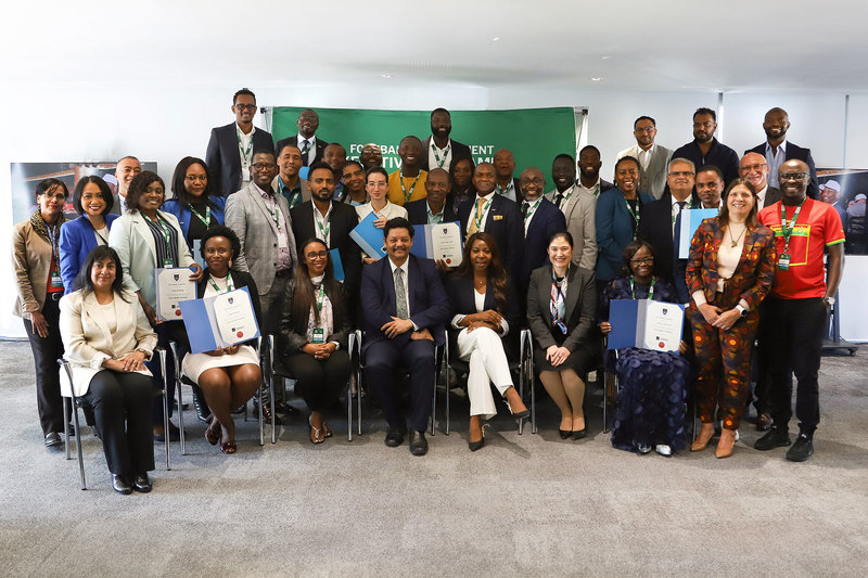 Attendees of UCT and CAF’s Football Management Executive Programme with their certificates.