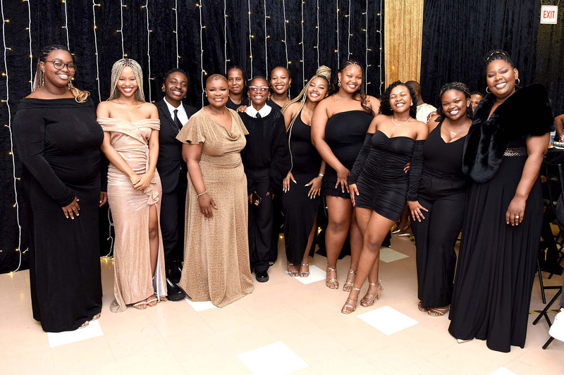 Tugwell Hall celebrated a half century of community, friendship, growth and excellence with a glittering alumni dinner and festive carnival open to all.