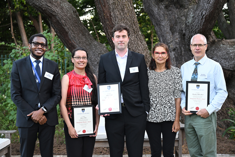 Vice-Chancellor Prof Mosa Moshabela (left) and DVC for Teaching and Learning Prof Linda Ronnie (2nd from right), with Distinguished Teacher Award 2023 recipients (from left) Dr Bianca Tame, Dr George Hull, and Prof Brandon Collier-Reed.