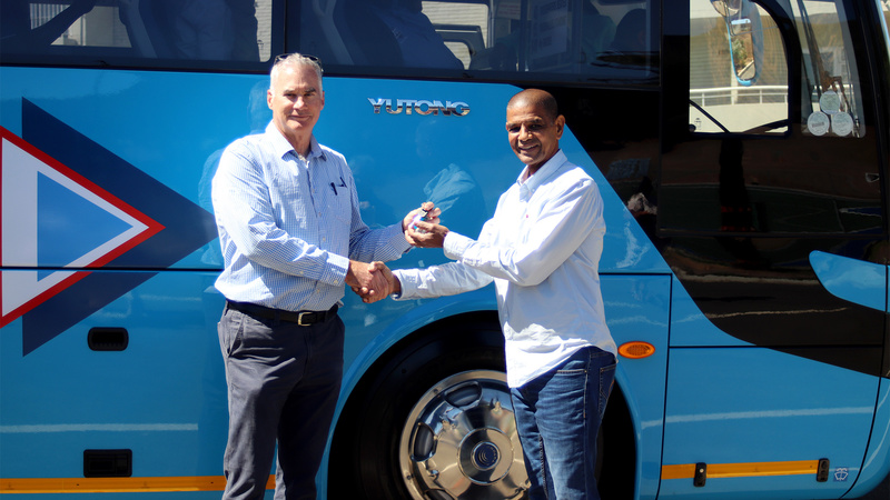 Peter Llewellyn, regional operations manager, Bidvest Bank (left) handing keys to the new fleet over to Clive Lippert, transport manager, UCT.