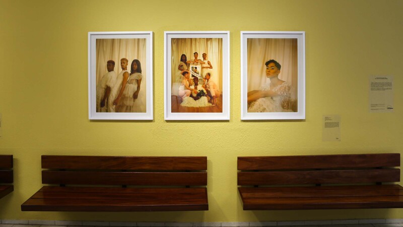 Haneem Christian’s “The Memorial Ball” photo series lines the walls of Beattie Building’s lower foyer.