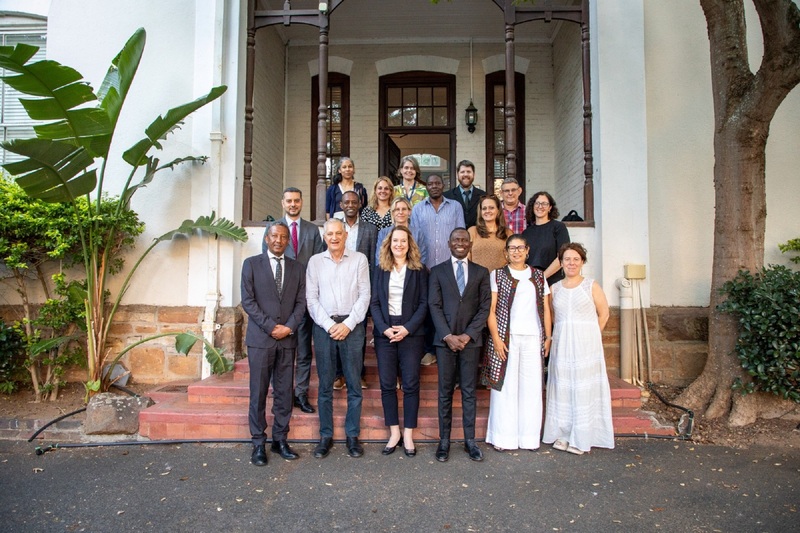 Meeting with academics at a UCT-hosted thinktank, the UN director general of the International IOM, Amy Pope (front centre), highlighted the importance of evidence-based migration reform.