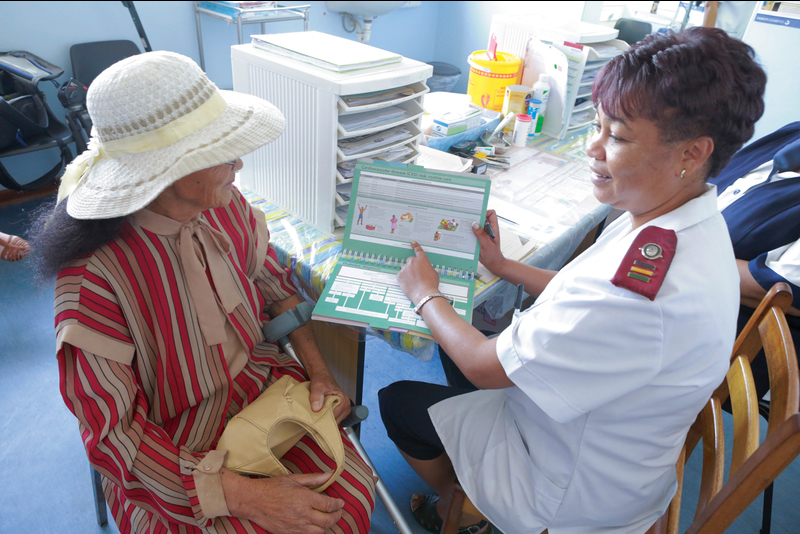 Clinical Nurse Practitioner Sister Lelani Schoeman seeing a patient using PACK in Oudtshoorn Clinic, Eden District in 2013. Photo by UCT TV.