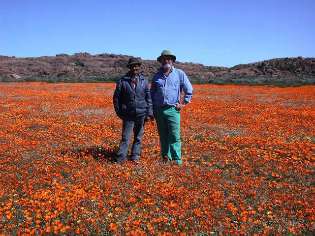 Professor Timm Hoffman, Leslie Hill Chair of Plant Conservation, Department of Biological Sciences, with Mr Johannes van der Westhuizen.