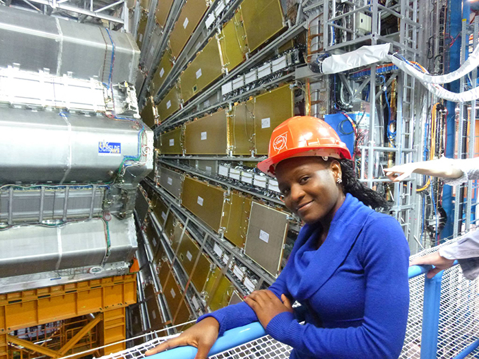 PhD student in particle physics, Chilufya Mwewa, in the ATLAS cavern at CERN in Switzerland.
