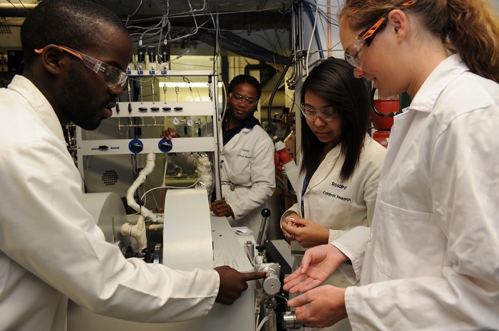 One of the advantages of c*change, says postgraduate Thulani Nyathi, is the highly qualified people who are able to train students in the use of equipment. (From left) Nyathi is seen here with Motlokoa Khasu, Rosalind Stegmann and Erin Trenor.