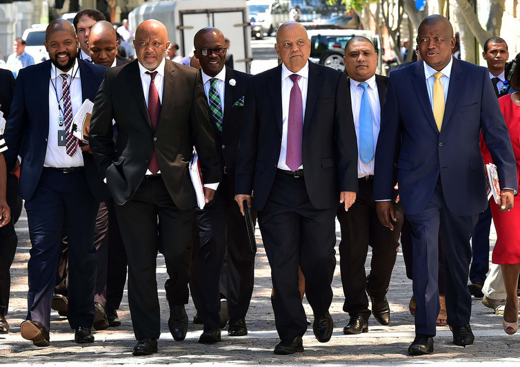 Former Finance Minister Pravin Gordhan flanked by Deputy Minister Mcebisi Jonas and Director General Lungile Fuzile. GCIS