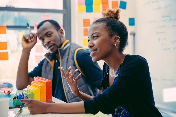 UCT d-school students Joseph Omidosu and Asia Sultan. It may look like a game of Lego, but it’s a serious exercise in innovation.