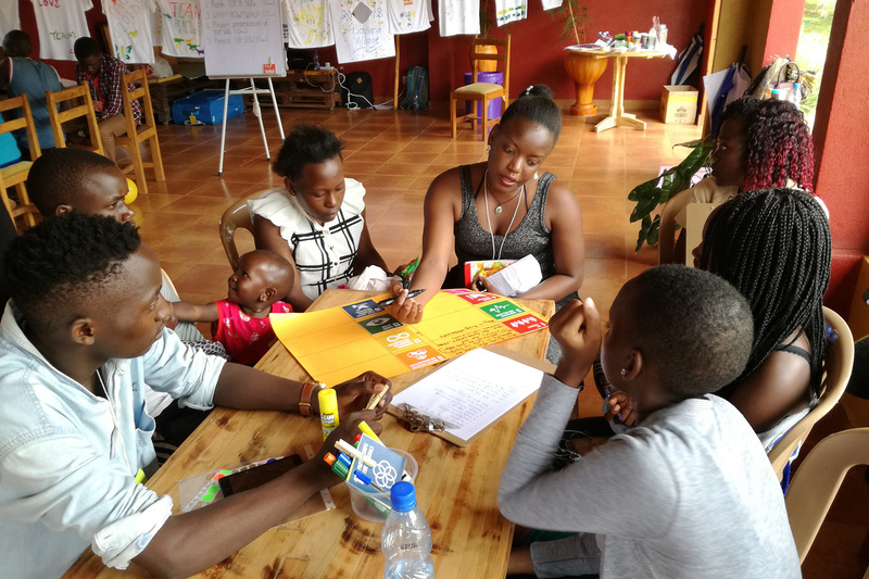  Teen Advisory Group Uganda: Adolescents selecting and discussing the eight Sustainable Development Goals they feel are most important to them as young people.