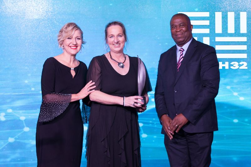 Professor Marianne Vanderschuren (middle) receiving the Special Annual Theme Award at the 2022 National Science and Technology Forum (NSTF)-South 32 awards