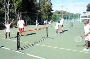 learners on tennis court