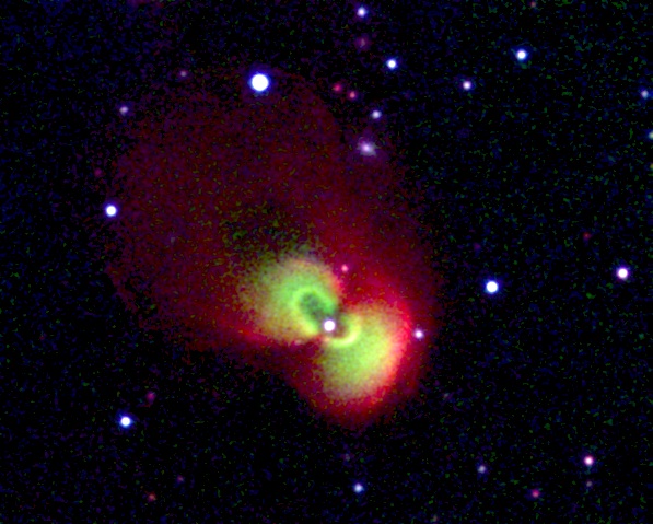 Colour image of Te 11 made from images showing light from Hydrogen and Nitrogen gas (red), Oxygen gas (green) and visual light (blue).
