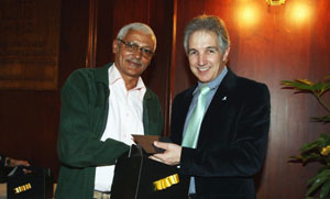 Retiree William Melenephy with VC Dr Max Price