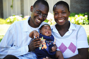 Singumbe Muyeba and Abigail Kabandula with Christian