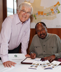 Prof Thandabantu Nhlapo (seated) with Anthony Davies