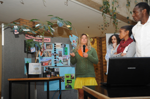 Student Isabelle Giddy presents at a ceremony to celebrate the UCT Global Citizenship