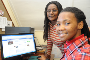 UCT web editor Shumi Chimombe (left) and web intern Mamello Mongoatu