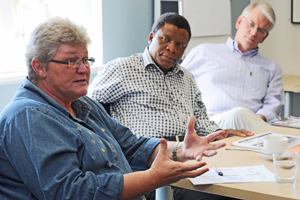 (from left) Prof Di McIntyre, Assoc Prof Mills Soko, and Prof Robert Mattes