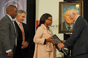 SRC president Amanda Ngwenya presents a portrait to Sir Sydney Kentridge