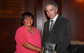 Retiree Adelaide Rooks is congratulated by vice-chancellor Dr Max Price.