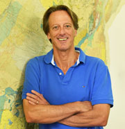 John Compton is trained as a low–temperature geochemist, and his general area of interest is the geochemistry of marine sediments. More recently, he's become interested in the role of Pleistocene climate change and sea–level fluctuations in the evolution of humans in Southern Africa. He also convenes the first–year course, Introduction to Earth and Environmental Sciences.