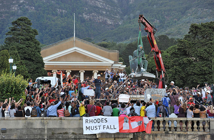 The moment so many were waiting and campaigning for. Cecil John Rhodes&rsquo; statue is lifted off its plinth &ndash; a temporary removal at this stage &ndash; in front of euphoric crowds on 9 April. The statue was first placed on upper campus in 1934 and then moved to the Jameson Steps in 1962. Photo by Michael Hammond.