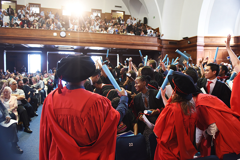 Newly capped graduands celebrate their success at the Faculty of Health Sciences graduation ceremony on Wednesday 20 December.