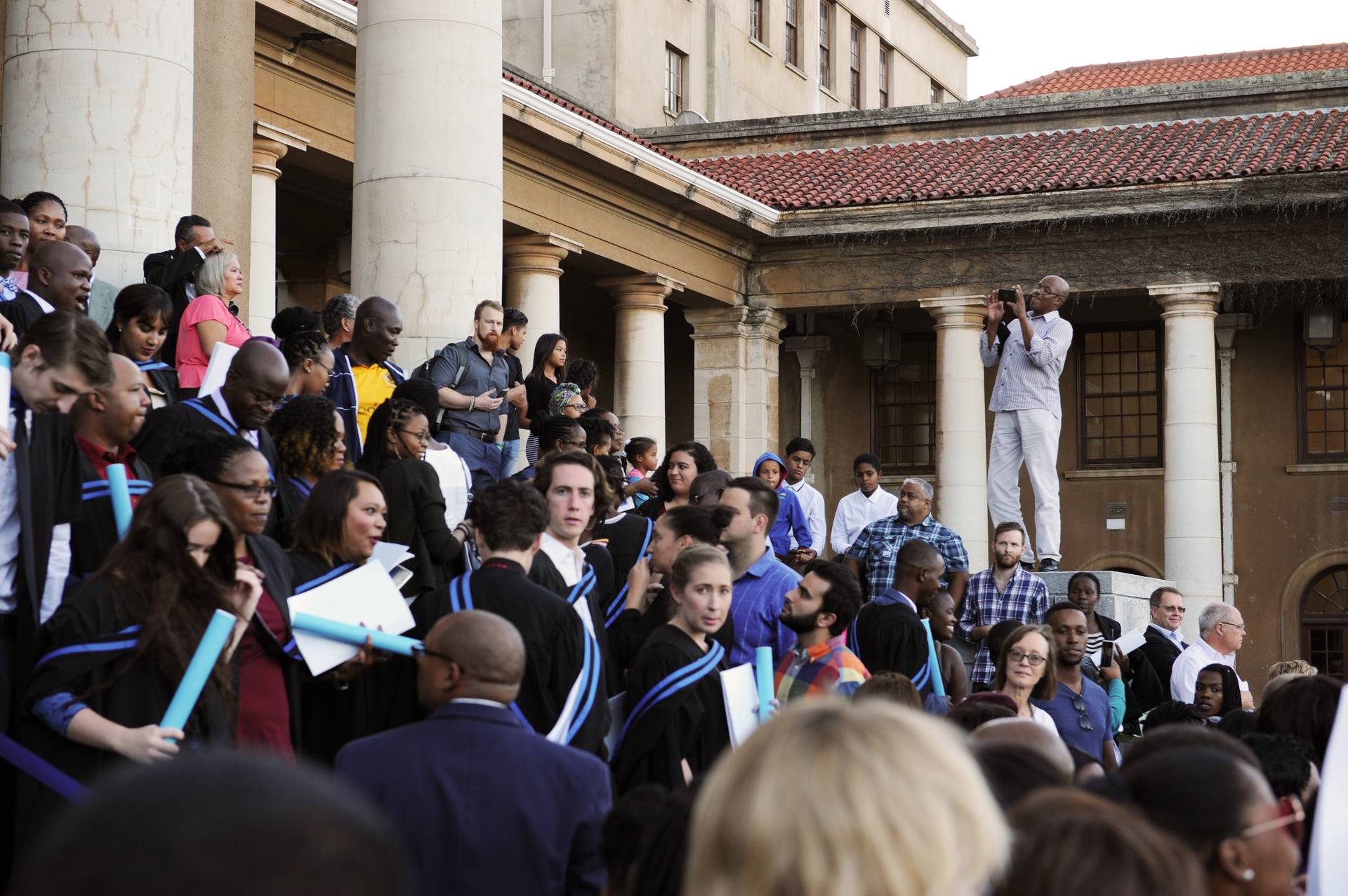 Graduates and their guests stream out of the Jameson Hall.