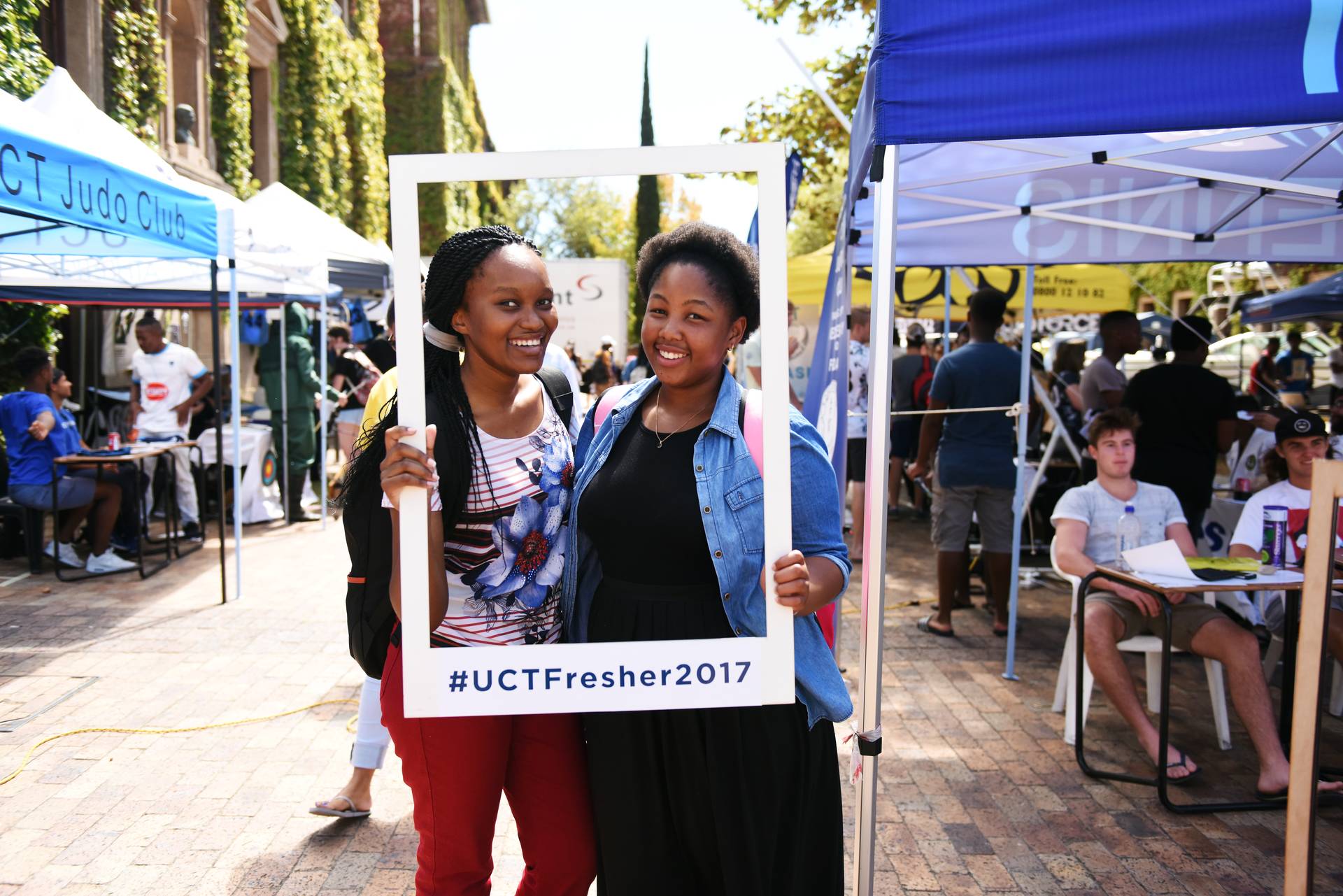 Freshers having fun during plaza week, where UCT sports clubs and student societies flaunt their wares.